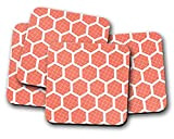 Dessous de verre orange avec un motif géométrique hexagone blanc, sous-verres