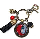 Porte clés bronze cabochon verre fillette et coccinelle - bijou de sac rouge et noir - Pompon - Coccinelle & ...